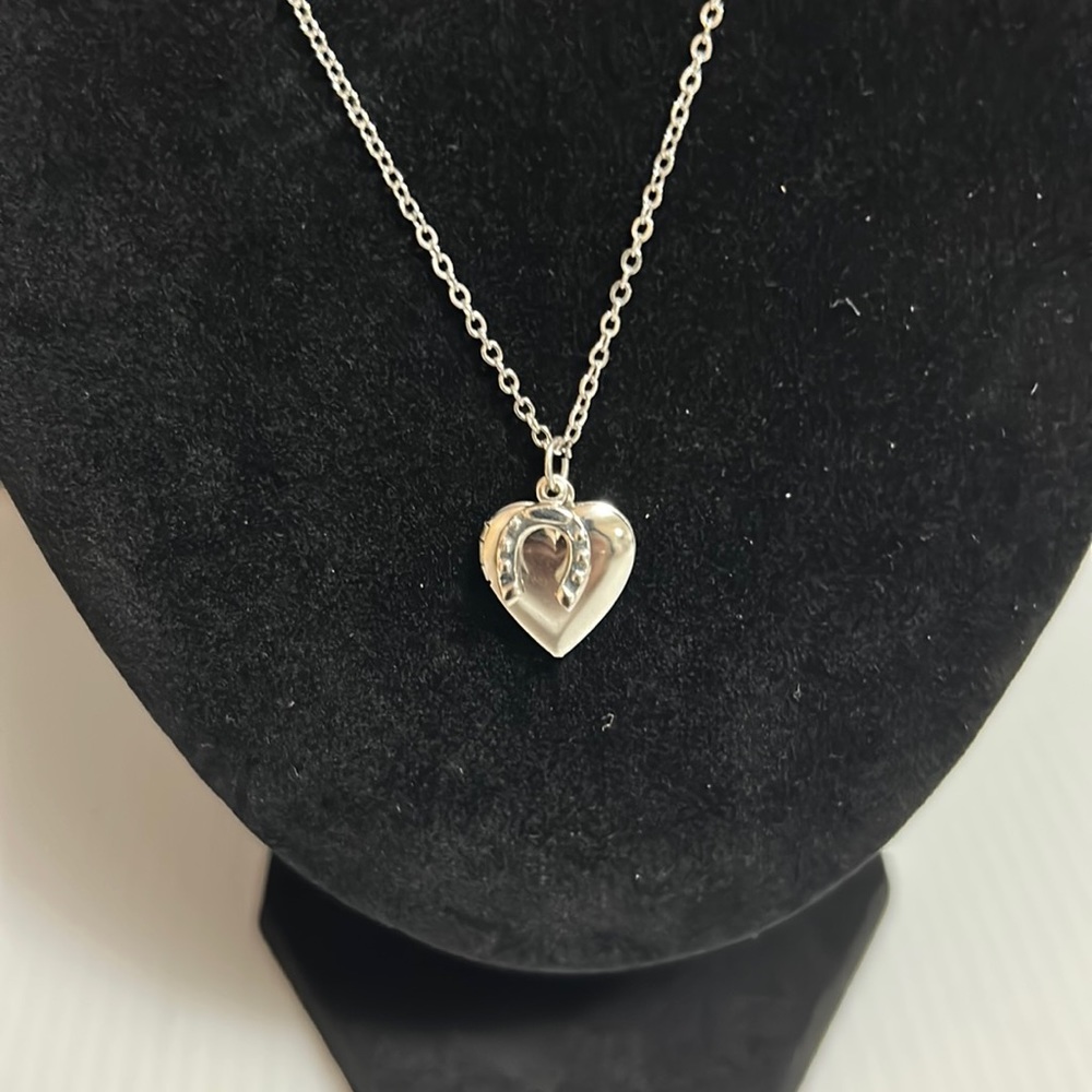 Silver heart locket necklace with small horseshoe
